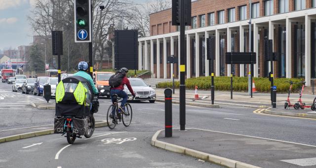 Cycling infrastructure being used in Birmingham by two cyclists