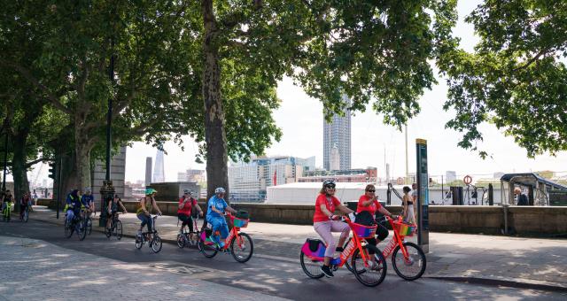 Women cycling along the East West Cycle Superhighway in London