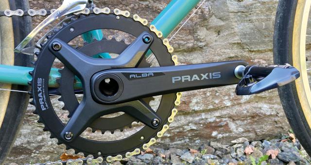 A close-up of the Alba Praxis chainset on a bike