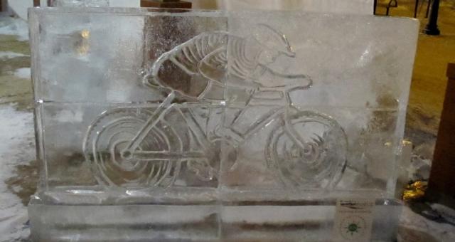 An ice sculpture showing a person on a bike