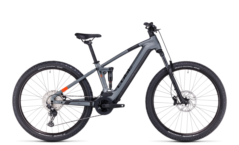 A dark grey full-suspension e-mountain bike against a white background