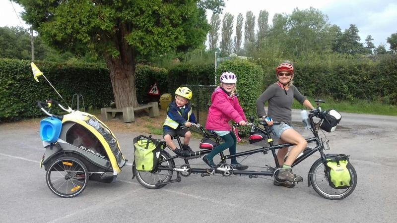 Josie Dew, Cycling UK's Vice President, cycling to school with her family