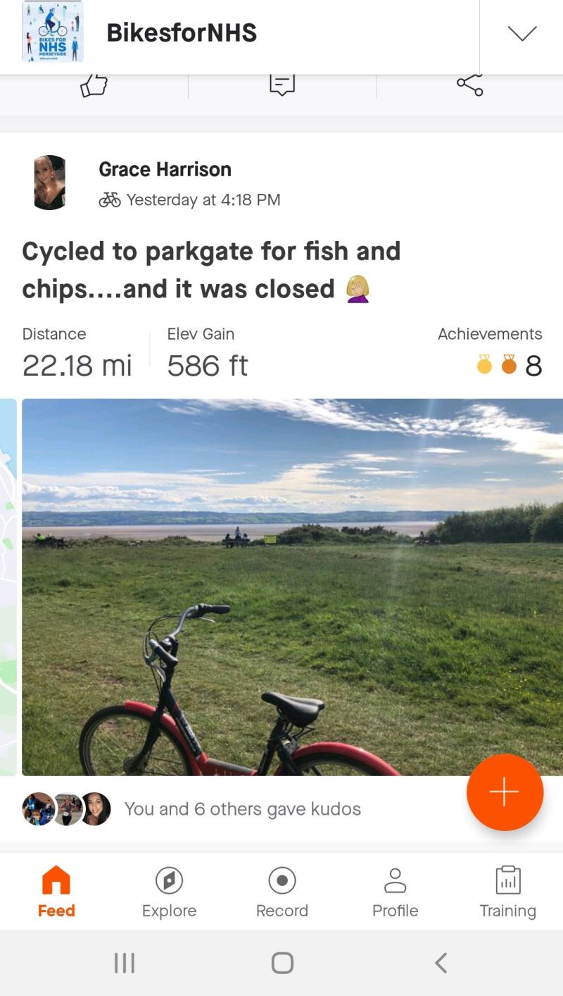 A screenshot of a bicycle with the coast in the background from the Strava app