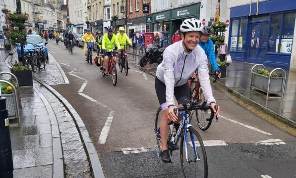 A mass cycle ride through Wells city centre, Somerset