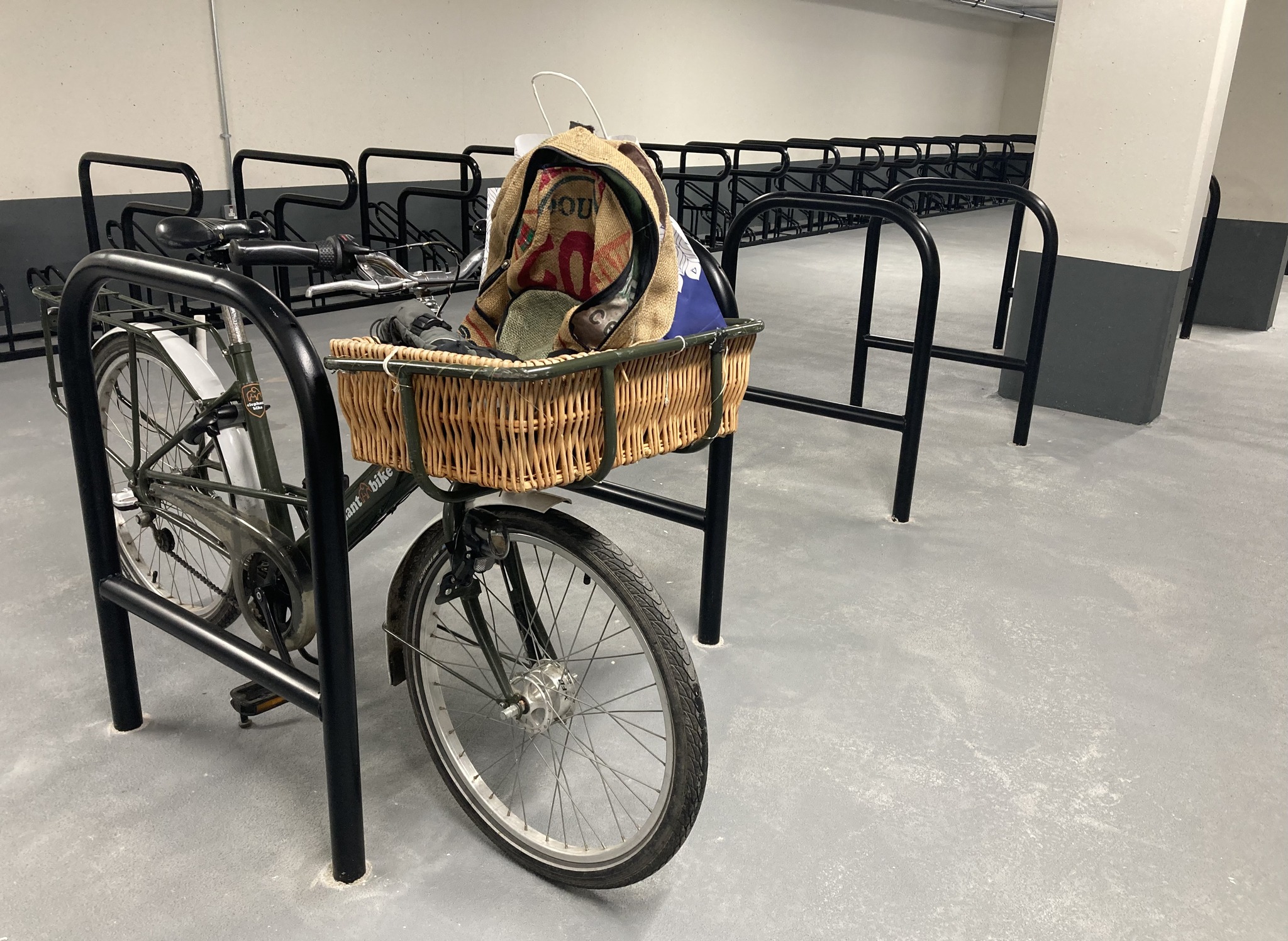 An Elephant cargo bike parked at a Sheffield stand in Park Street cycle park