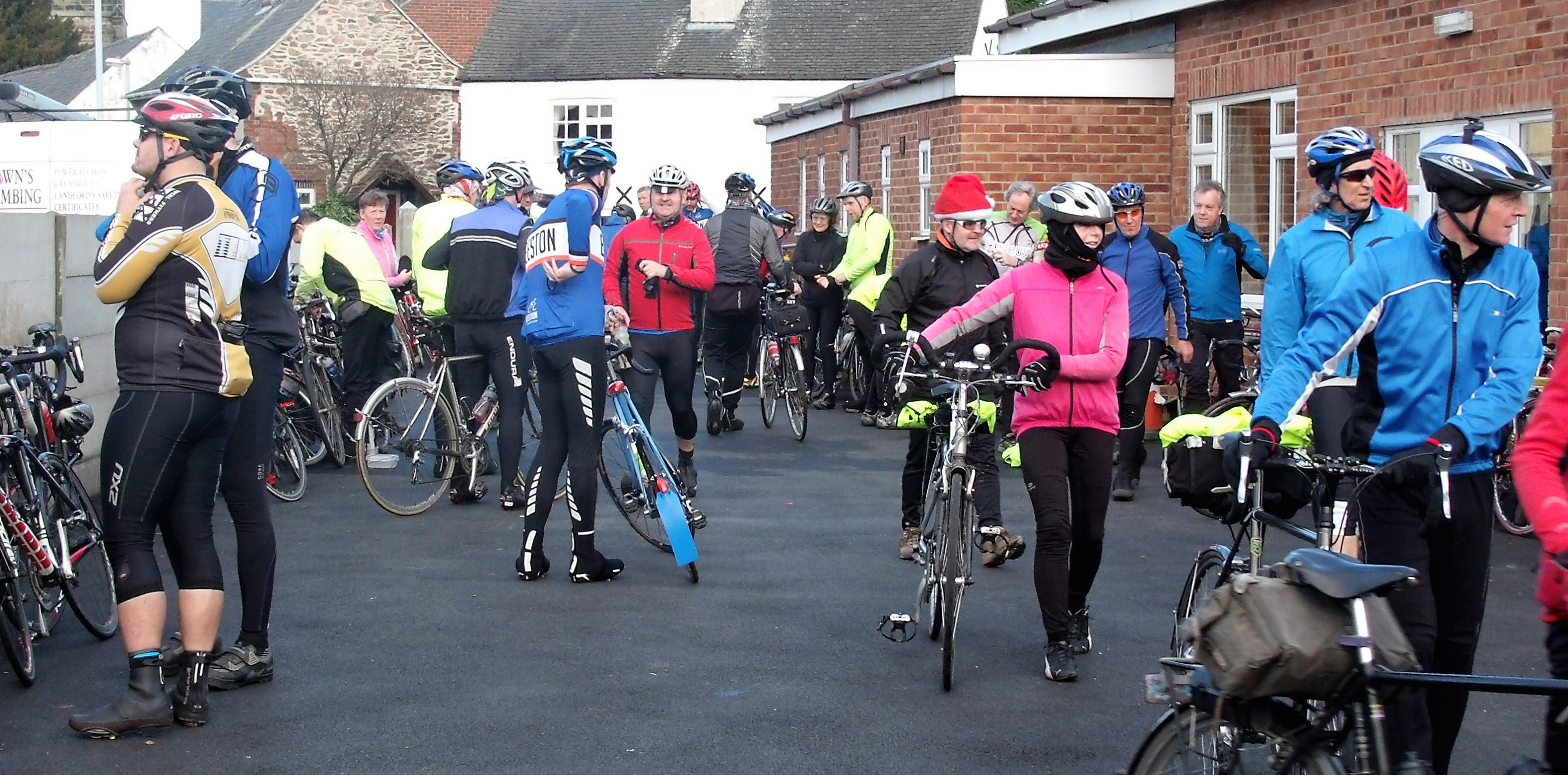 Groups of cyclists outside the hall