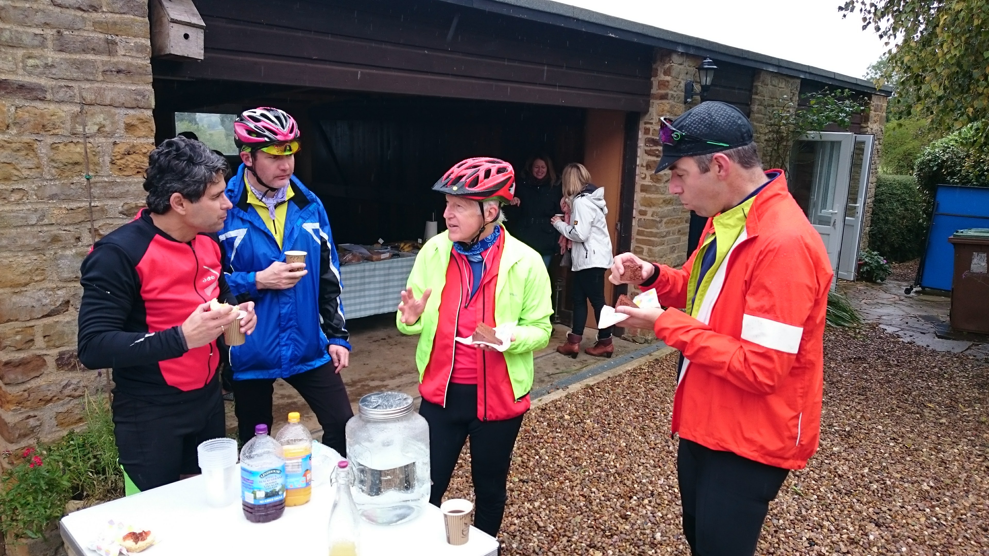 CTC Northampton cyclists enjoying coffee and cake outdoors at the renowned Great Brington pop-up cafe
