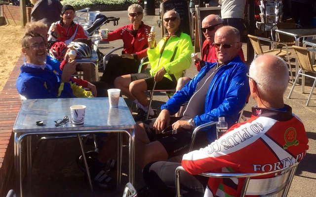 Group at a cafe eating ice cream outside