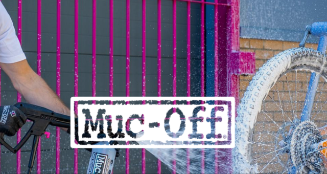 The 'Muc-Off' logo with a person cleaning a bike with product