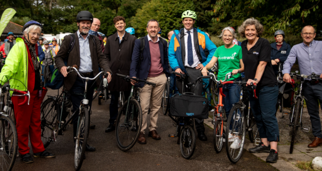 Active Travel Act Ten Year Anniversary gathering featuring Cycling UK staff, members of the public and Welsh MS
