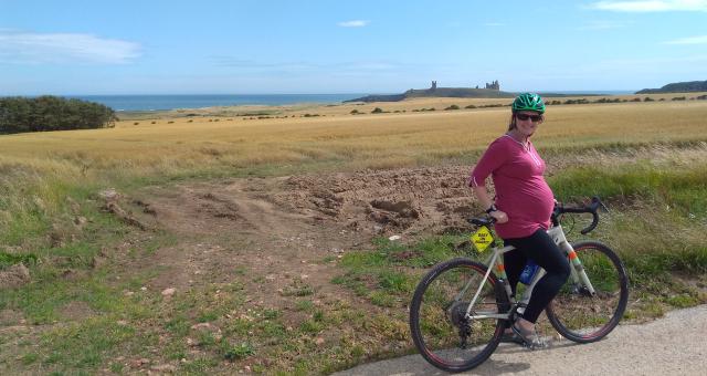 Laura Moss cycling at 37 weeks pregnant