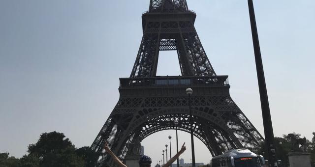 Posing in front of the Eiffel Tower