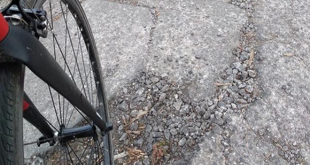 Cycle wheel in pothole