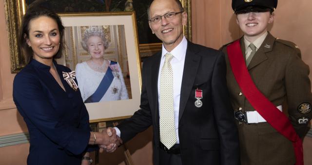 Malcolm Margolis receives his award from the Lord Lieutenant of North Yorkshire