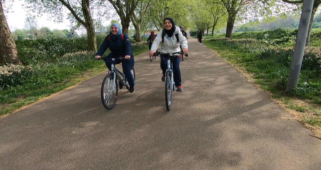 Two friends go for a bike ride in East London