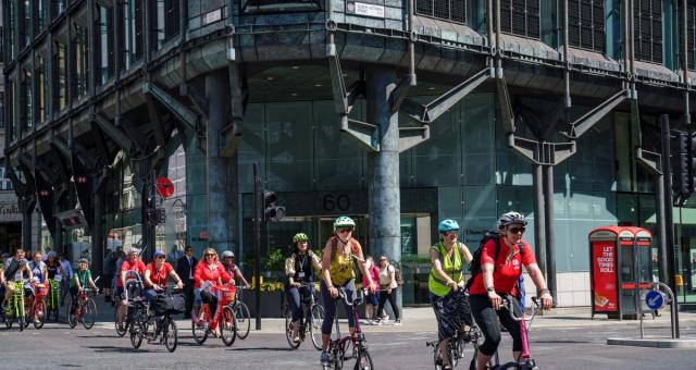 Women cycling in London