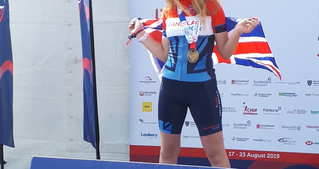 Jaimee receiving her gold medal at the World Transplant Games