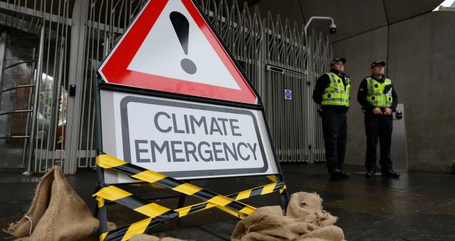 Climate emergency warning sign outside the Scottish Parliament