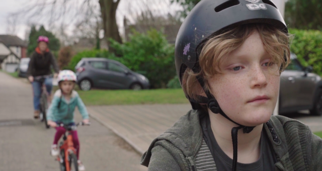 Family cycling on quiet roads