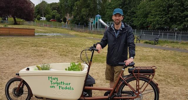 Colin with Dolly the e-cargo bike in the park