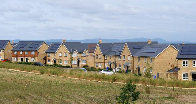 Car-dependent new housing (photo CC David Dixon)