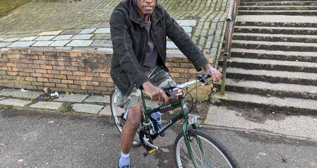 Man sitting on bike