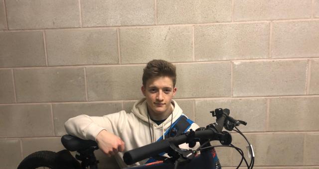 young man with bike