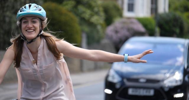 Cyclist signalling to turn left