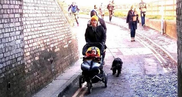 Several pedestrians, dog-walkers and a mother with a pram using the narrow Keyhole Bridge underpass when it was closed to motorised traffic shows how popular the closure was.