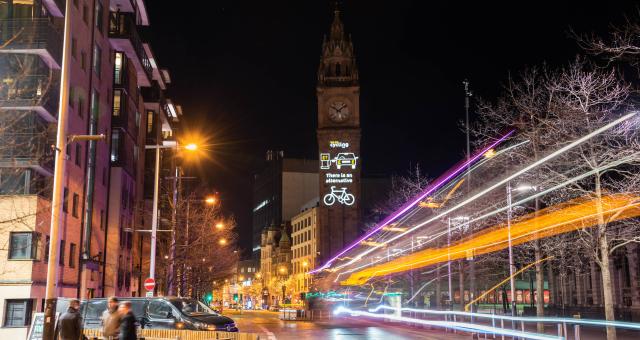The charity Cycling UK lights up the historic Albert Memorial Clock in Belfast with the pro-cycling message &quot;There is an alternative&quot; on March 31, 2022.