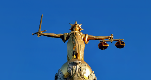 Scales of Justice (cc Wikimedia Commons)