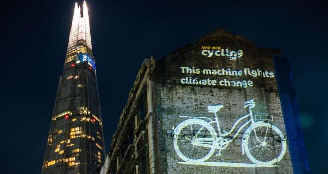 Projection of a cycle on a building in London