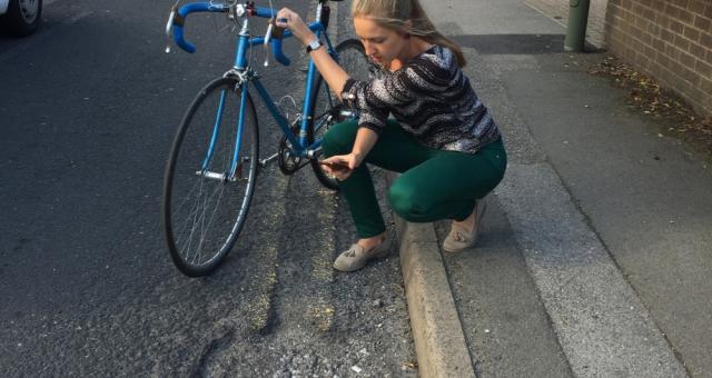 A cyclist using CTC's mobile fill that hole app to report a pothole