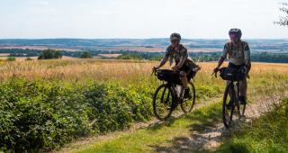 Two cyclists on a bridleway section of the Royal Chilterns Way route between South Stoke and Ewelme
