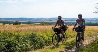 Two cyclists on a bridleway section of the Royal Chilterns Way route between South Stoke and Ewelme