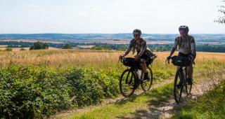 Two cyclists on a bridleway section of the Royal Chilterns Way route between South Stoke and Ewelme