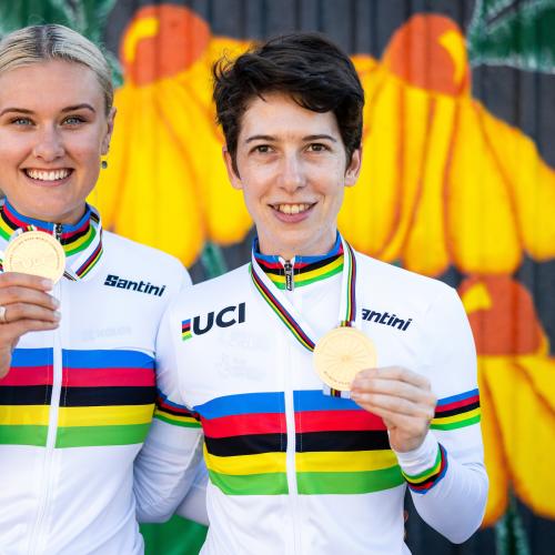 Sophie Unwin (right) and Jenny Holl (left) hold up their medals after winning gold in the Women’s Tandem Trial at the UCI Para-cycling Road World Championships. Credit: SWPix