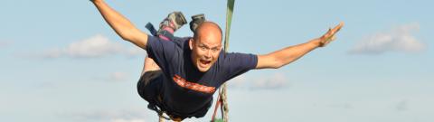 Man taking part in a bungee jump