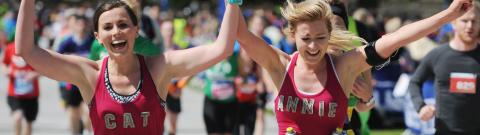 Two women running in a marathon
