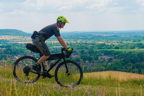 Two women riding bikes