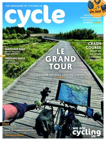 The front cover of Cycle magazine's June/July issue featuring a POV shot of a person cycling along a raised boardwalk over a marshland