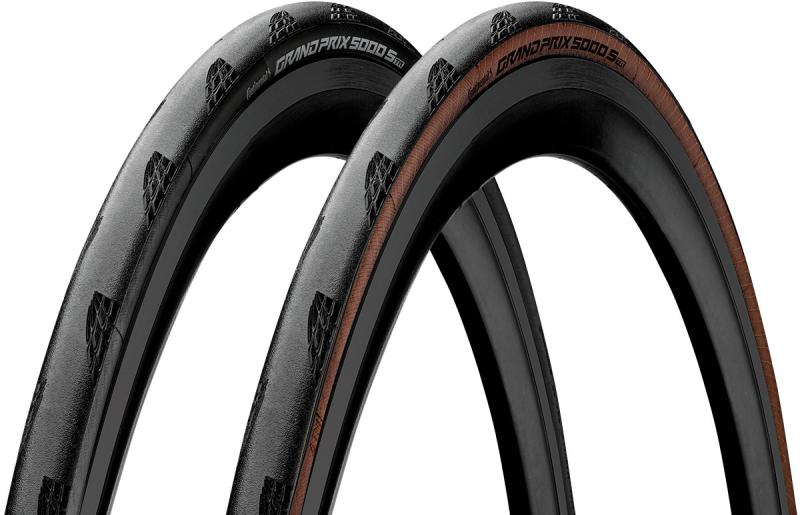 The top half of two road bike tyres showing the black and tan colour options