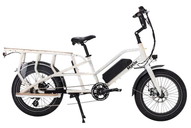 The Mycle Cargo, a white small-wheeled e-cargo bike with kickstand