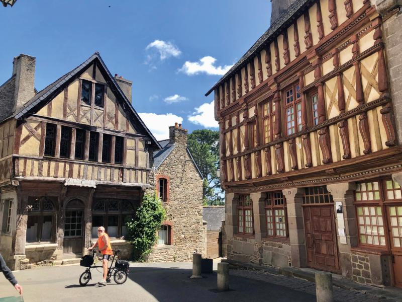 Harry on his bike in front of Morlaix’s lovely half-timbered houses
