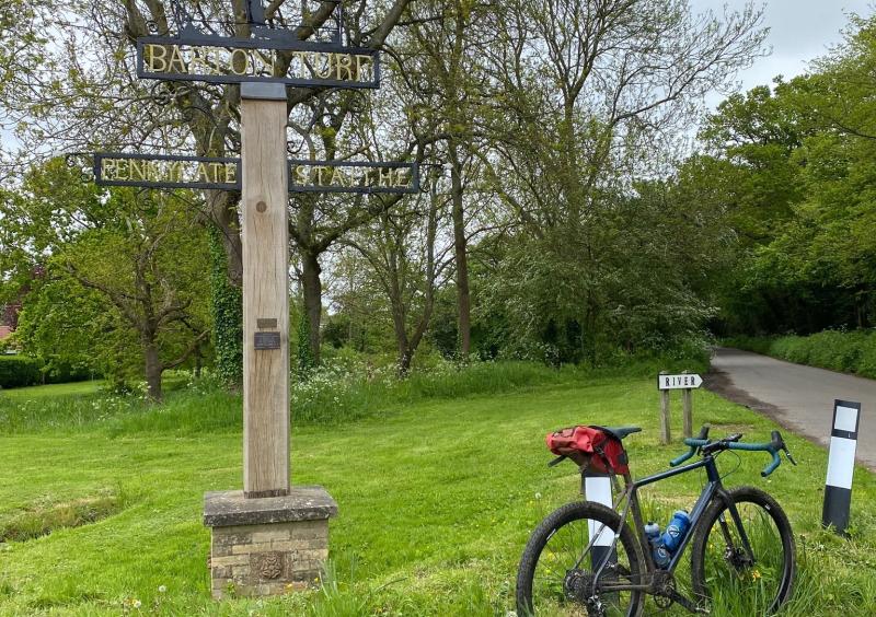 Barton Turf ironwork signpost