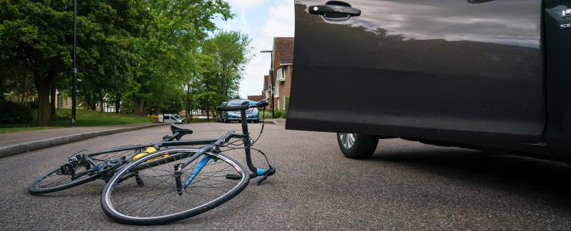 A bike with a buckled front wheel after a road traffic collision