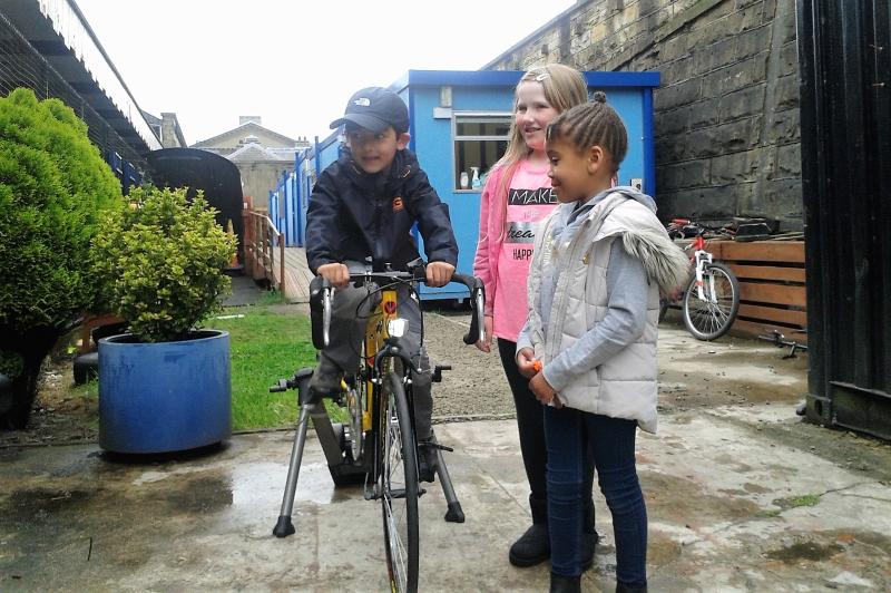 Children have a go at the smoothie bike