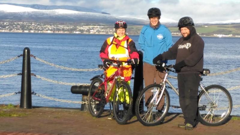 Chris with his bike on a Better Biking session with two others