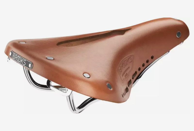 A brown leather bicycle saddle