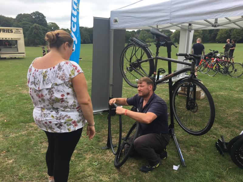 Cycling Development Officer Chris Alston demonstrates a puncture repair